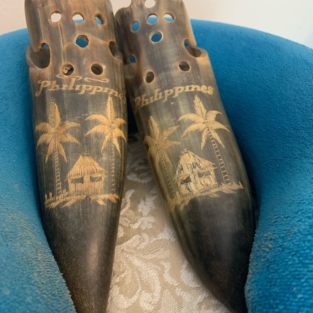Vintage water buffalo etched carved horns tiki hut palm trees  Phillipines